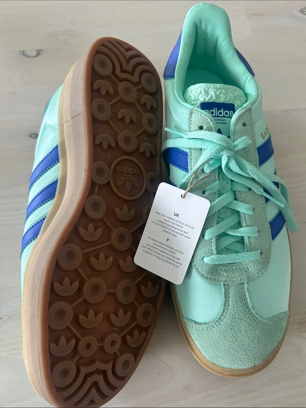 adidas Women’s Mint Green Sneakers with Blue Stripes